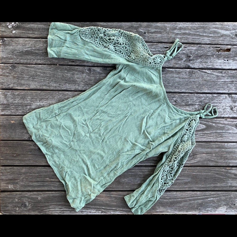 Mint green cold shoulder shirt.
